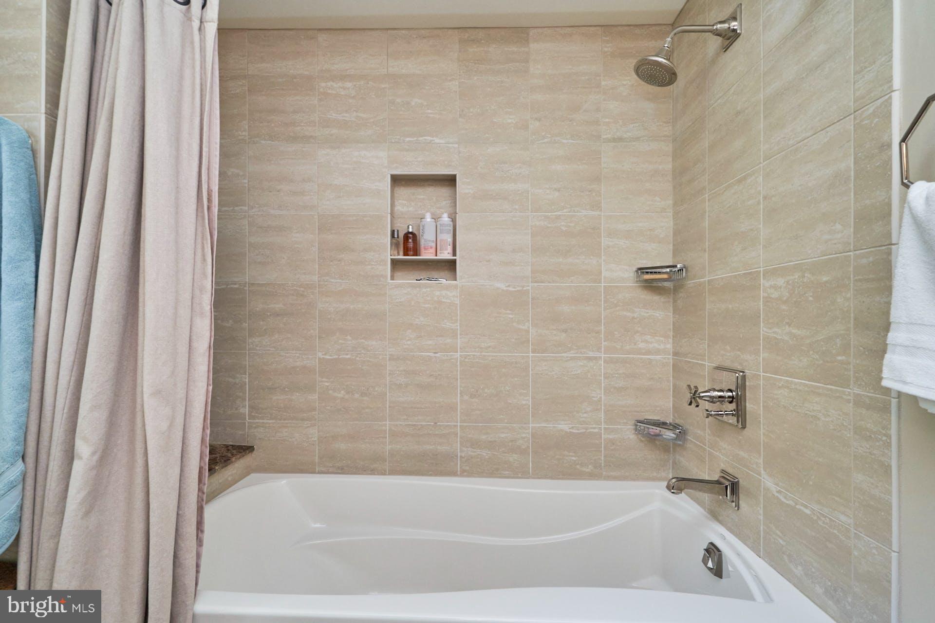 1235 Aldebaran Drive McLean, VA 22101 - Photo 39 of 71 Shared hall bath#1. Soaking tub/shower with bench