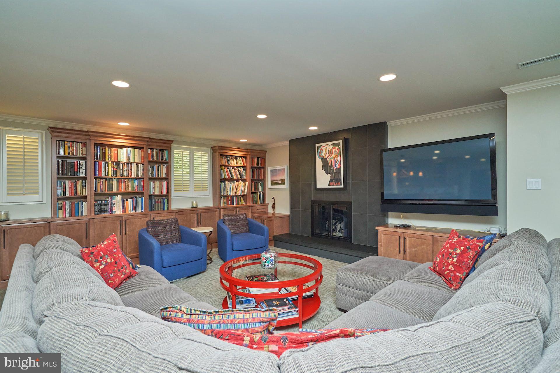 1235 Aldebaran Drive McLean, VA 22101 - Photo 47 of 71 Spacious rec room with loads of custom built-ins