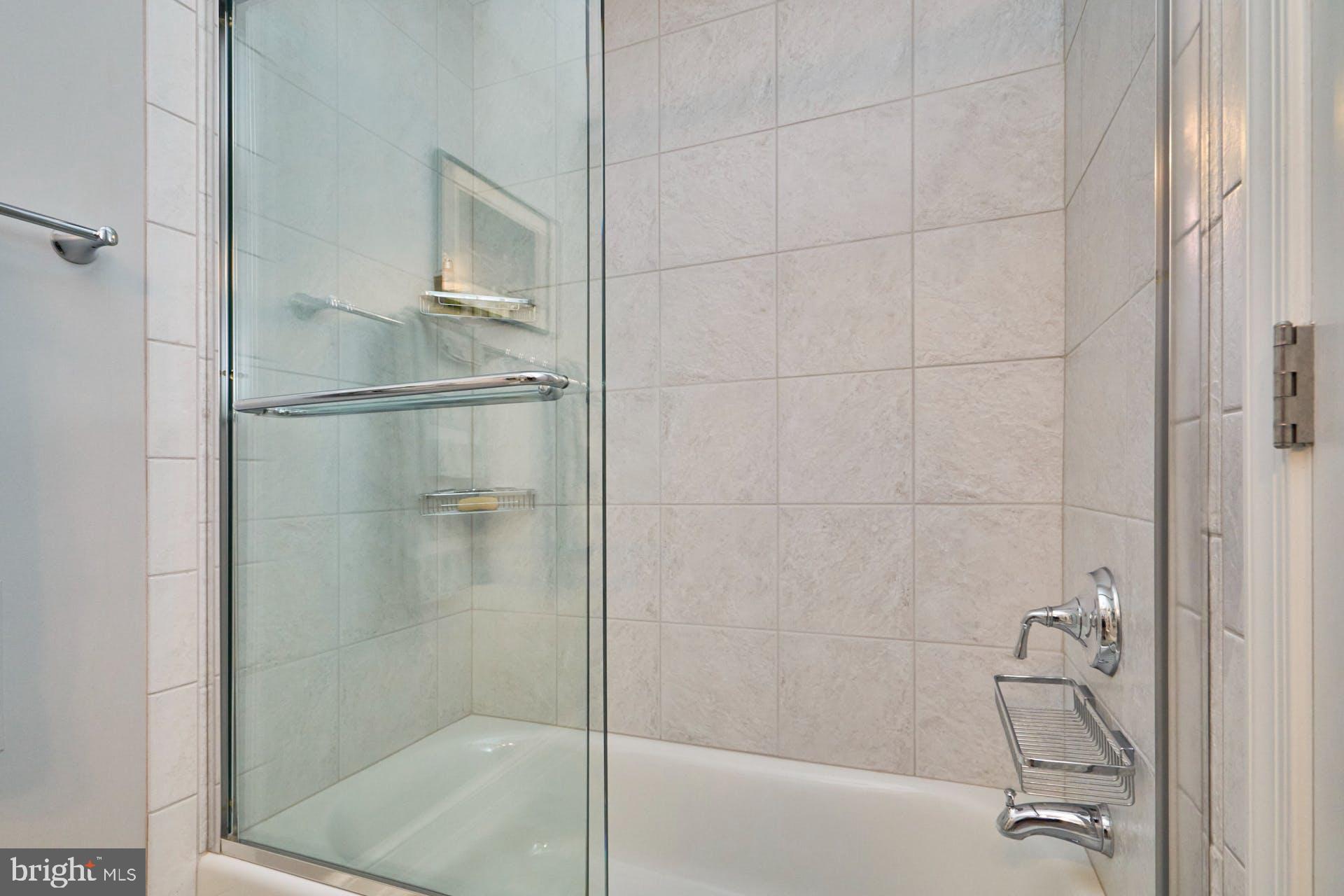 1235 Aldebaran Drive McLean, VA 22101 - Photo 57 of 71 Basement tub/shower with glass doors