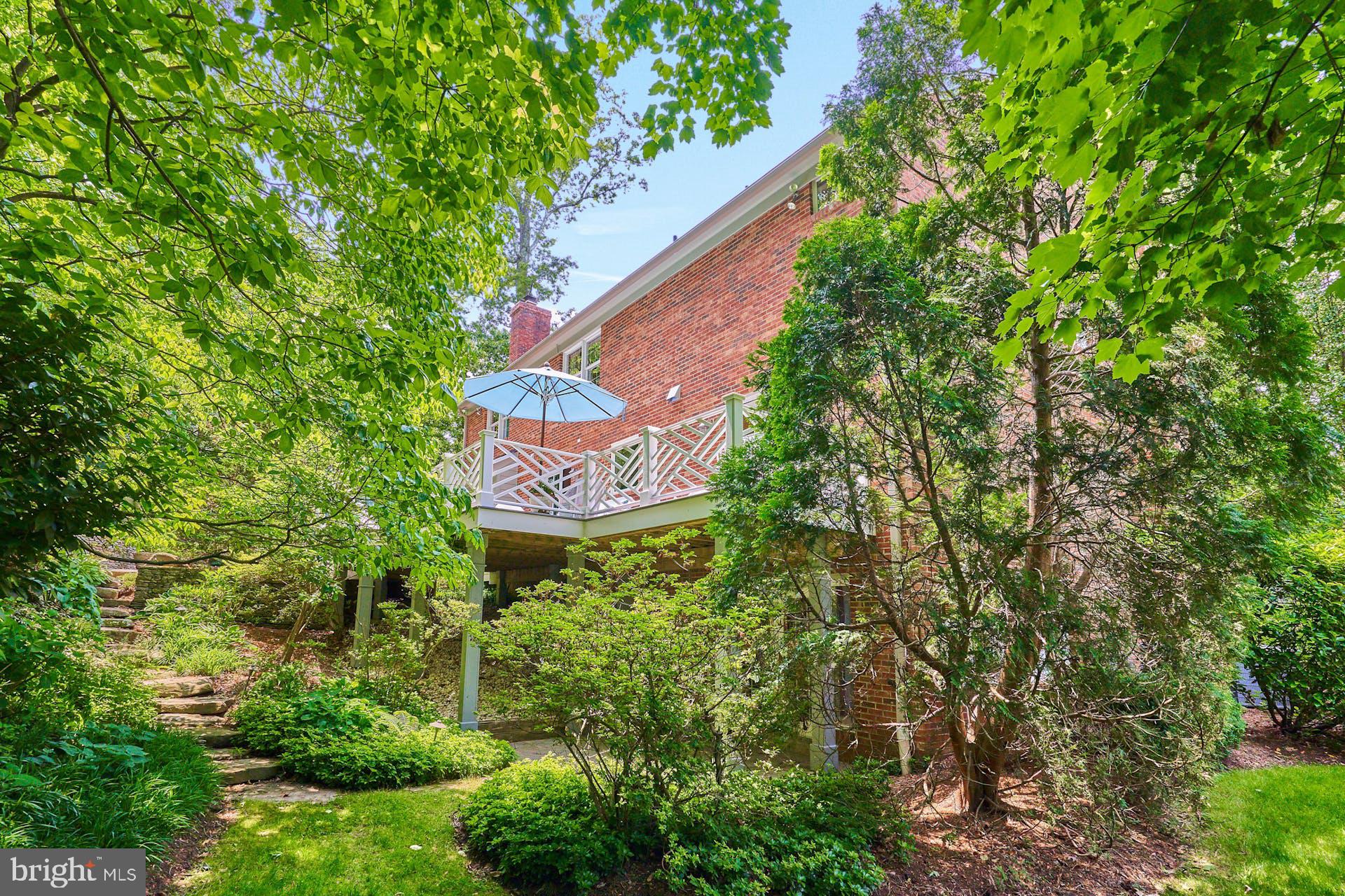 1235 Aldebaran Drive McLean, VA 22101 - Photo 60 of 71 Backyard with stone path to upper patio and deck