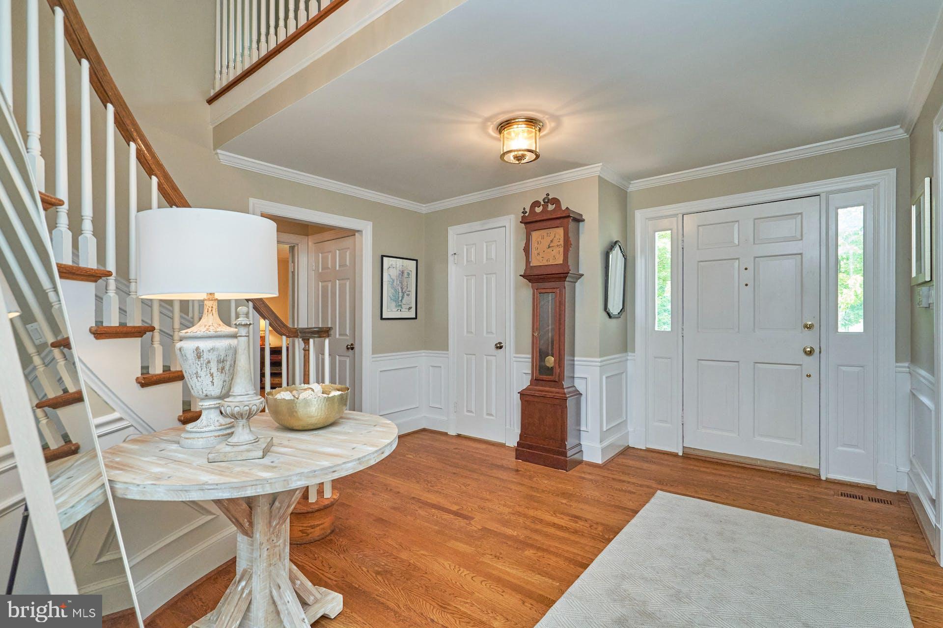 1235 Aldebaran Drive McLean, VA 22101 - Photo 7 of 71 Spacious foyer with wainscotting and crown molding