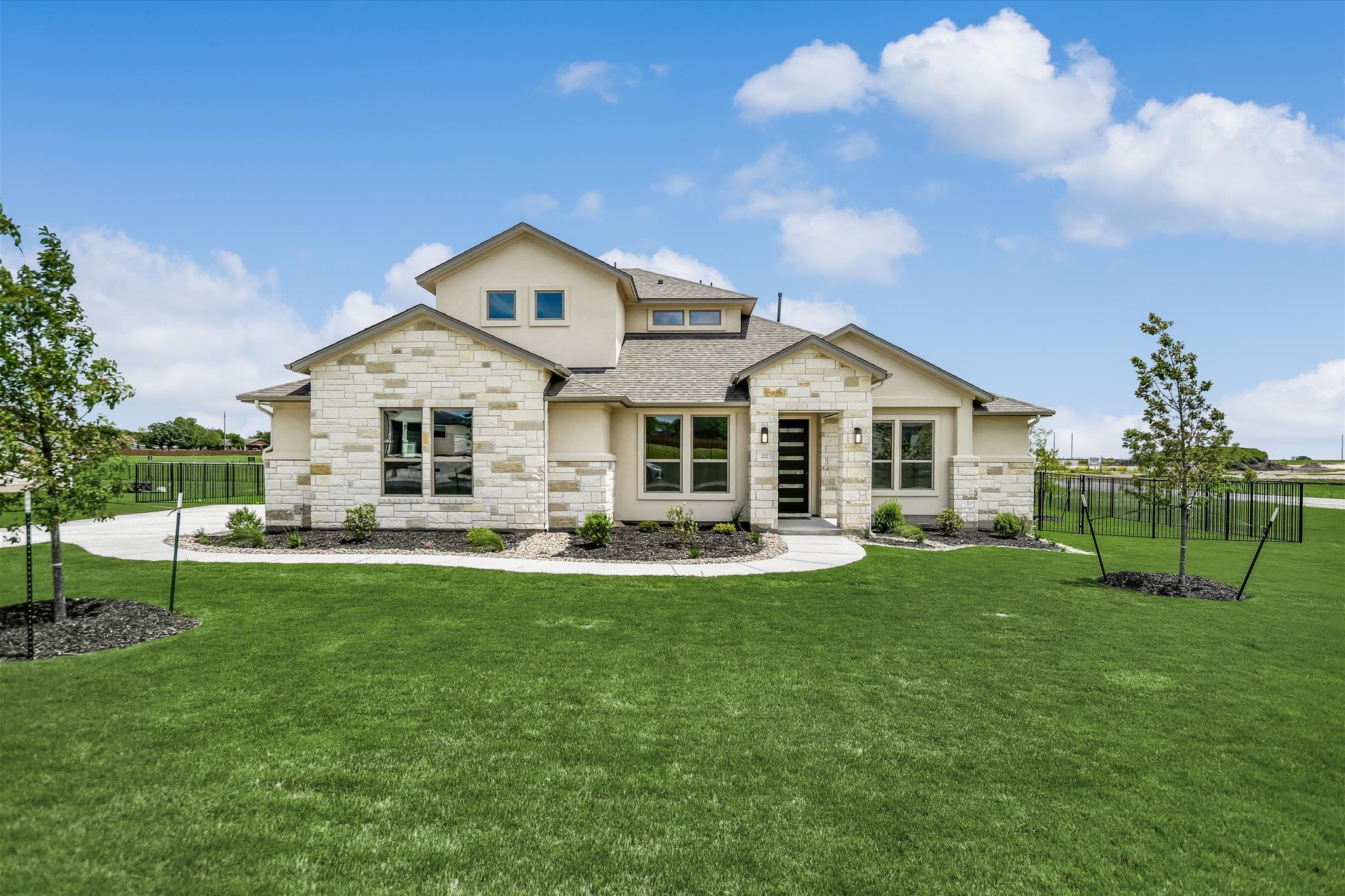 217 Scofield Avenue Georgetown, TX 78626 - Photo 1 of 31 a front view of a house with a yard