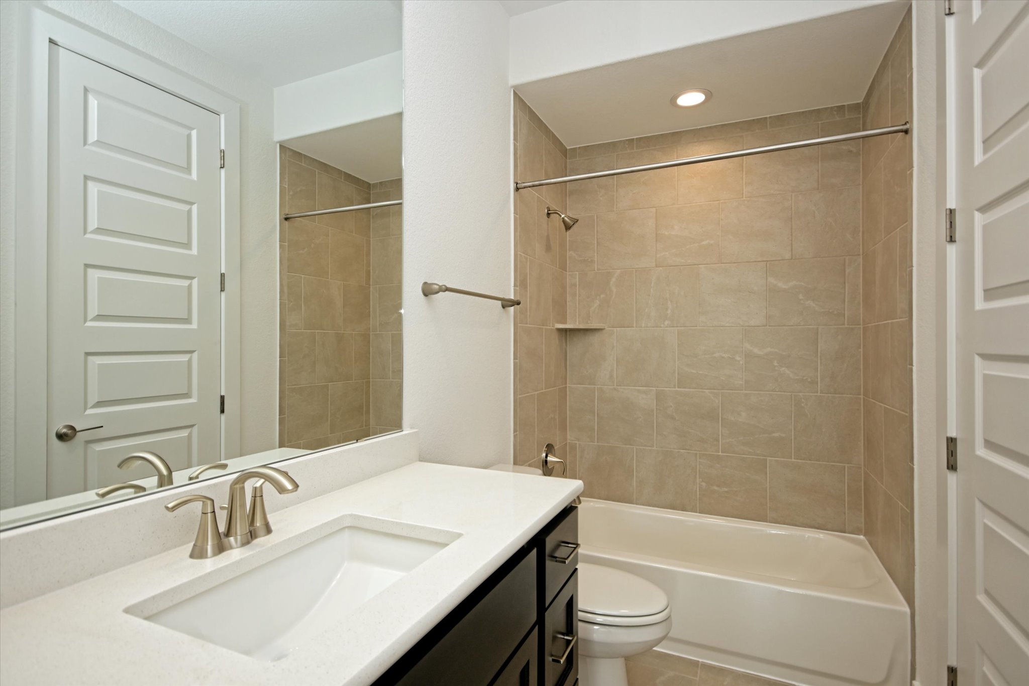 217 Scofield Avenue Georgetown, TX 78626 - Photo 20 of 31 a bathroom with a sink a toilet and shower