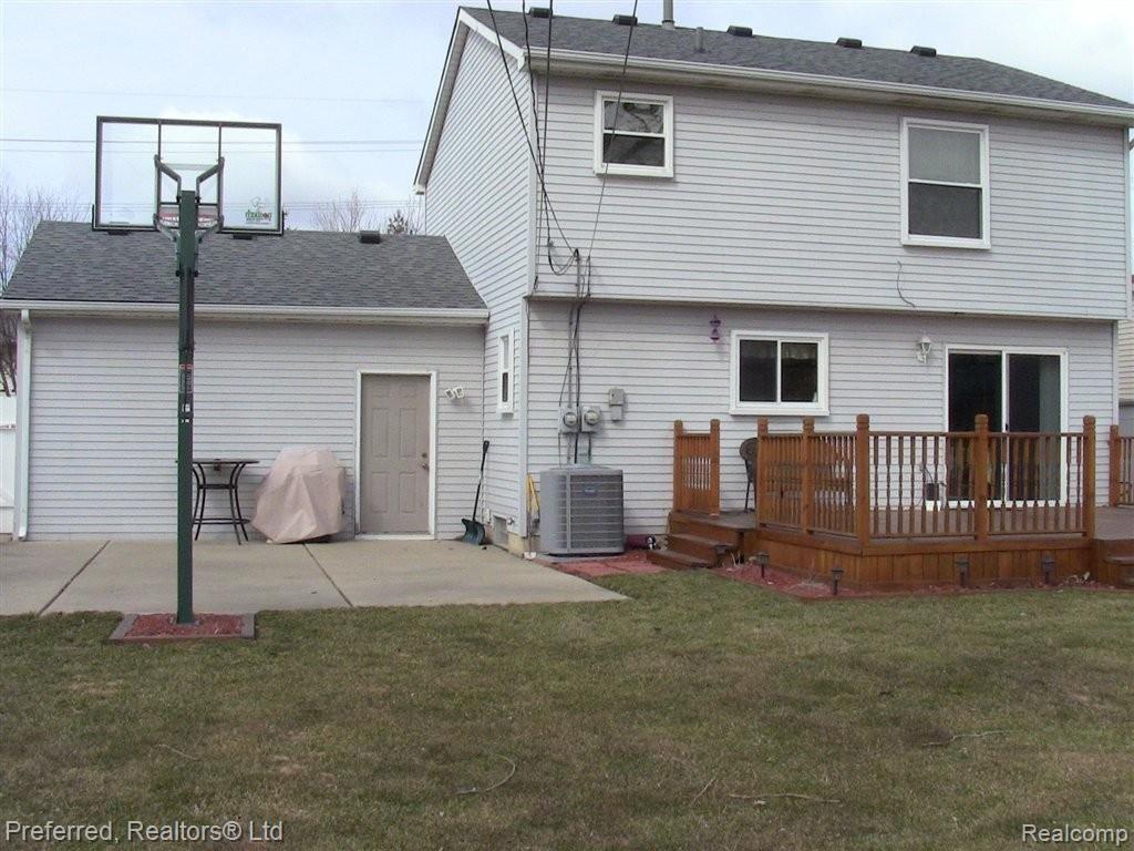 1986 North Sheldon Road Canton, MI 48187 - Photo 5 of 19 Back of Home with Deck and Patio