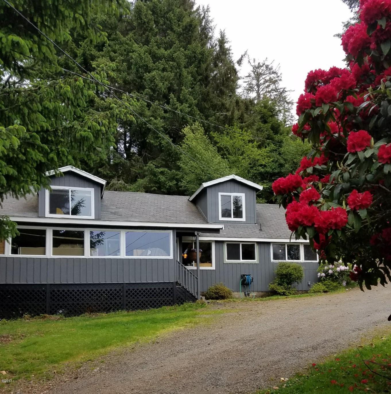 2970 Northeast East Devils Lake Road Otis, OR 97368 - Photo 1 of 12 Lake view country home