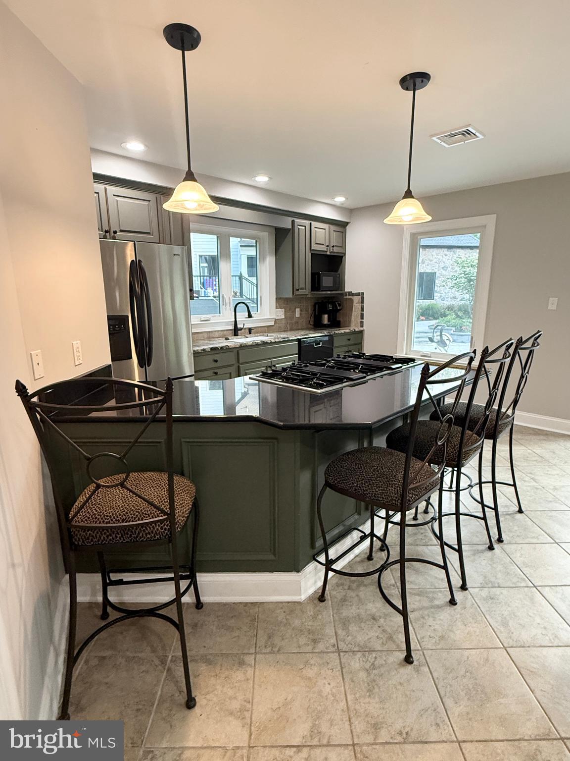 821 Burrows Run Road Chadds Ford, PA 19317 - Photo 118 of 146 a dining room table chairs and a chandelier