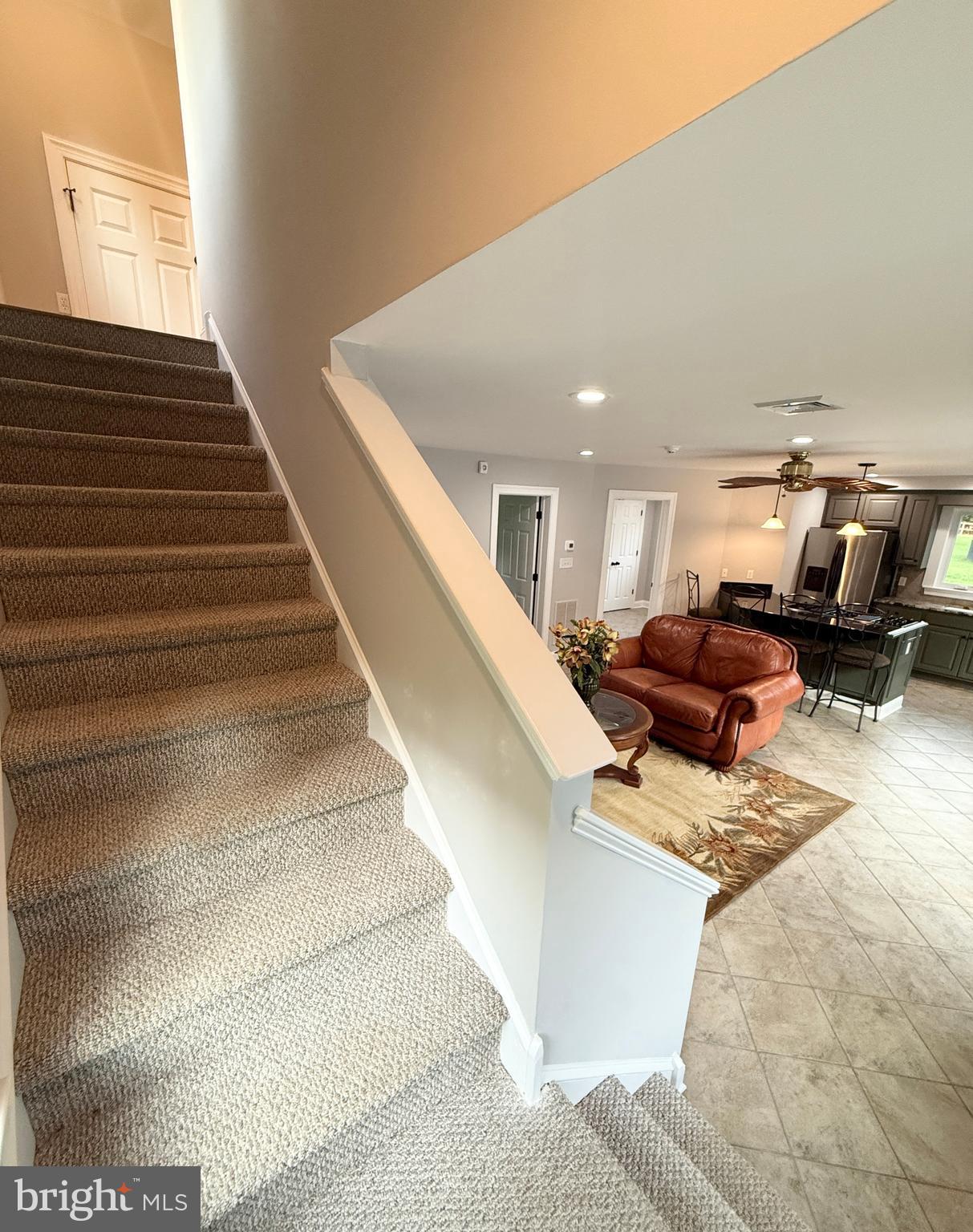 821 Burrows Run Road Chadds Ford, PA 19317 - Photo 125 of 146 a living room with furniture and stairs
