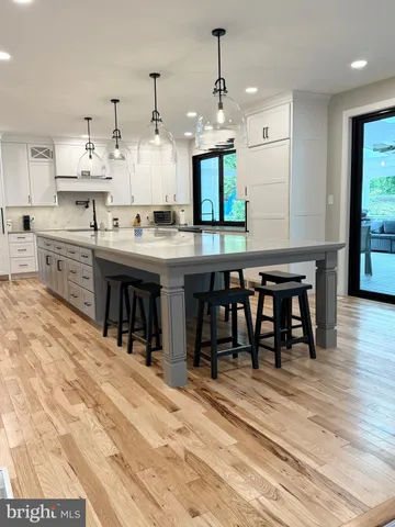 a view of a big room with wooden floor