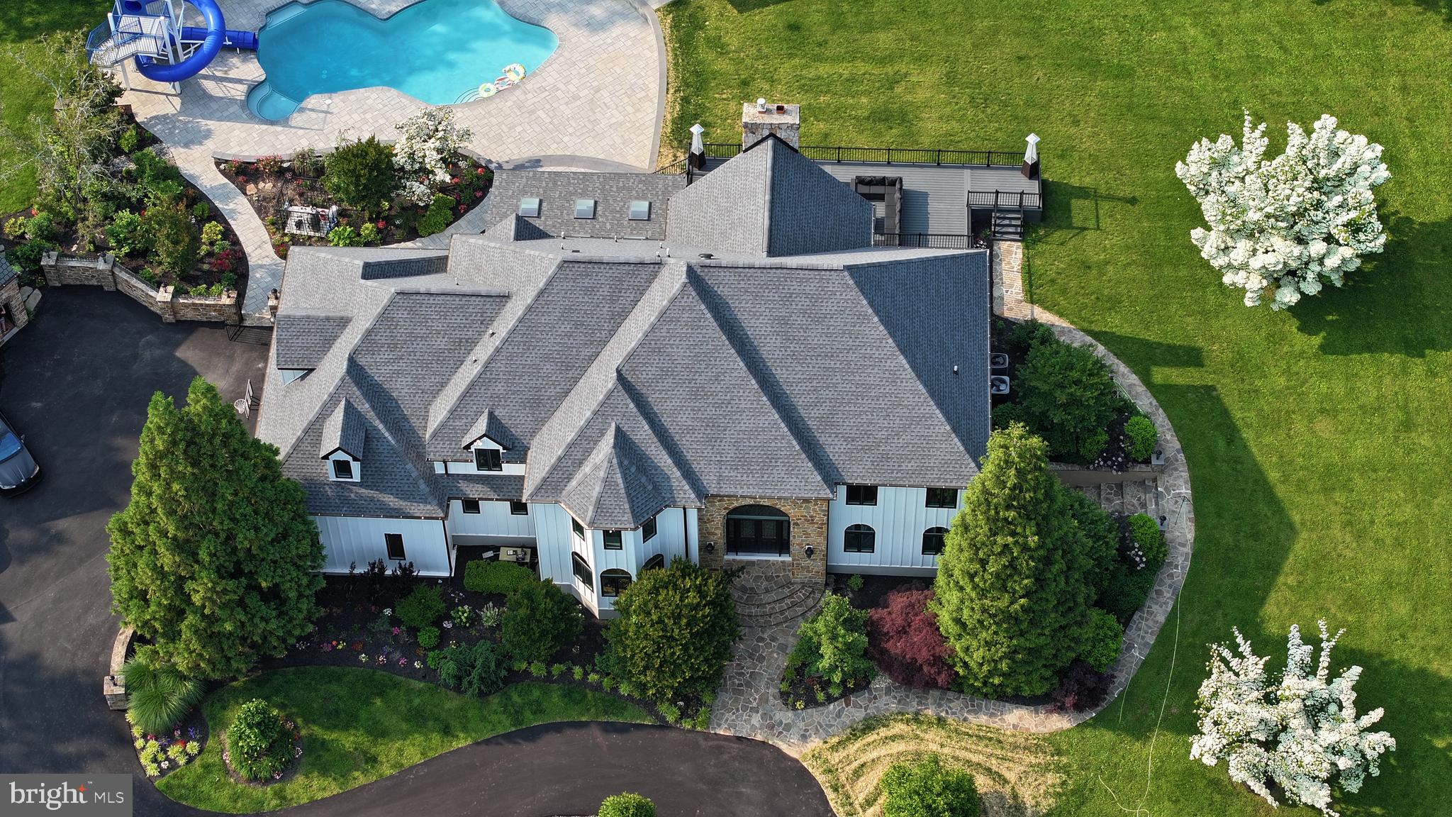 821 Burrows Run Road Chadds Ford, PA 19317 - Photo 5 of 146 an aerial view of a house with a yard and garden