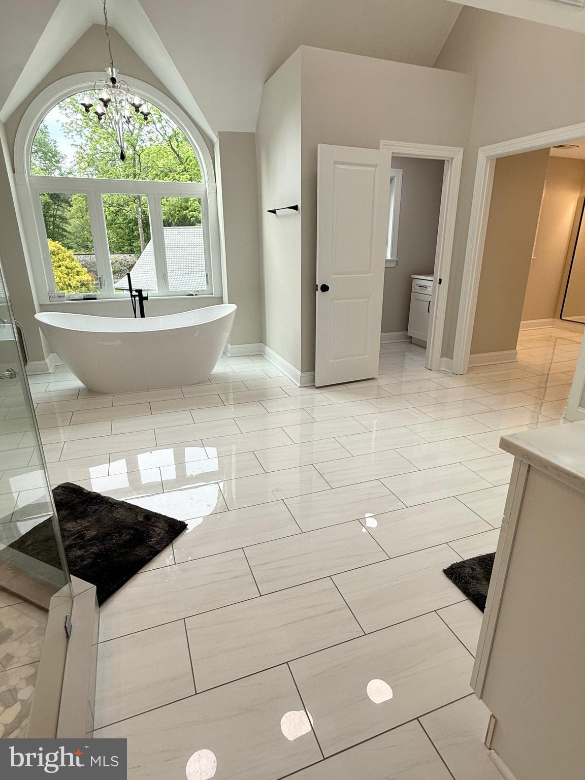 821 Burrows Run Road Chadds Ford, PA 19317 - Photo 96 of 146 a bathroom with a sink a large mirror and a shower