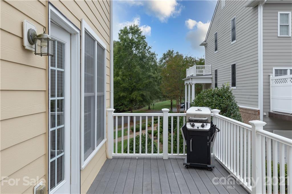 623 6th Baxter Crossing Fort Mill, SC 29708 - Photo 11 of 27 a view of balcony with wooden floor and fence