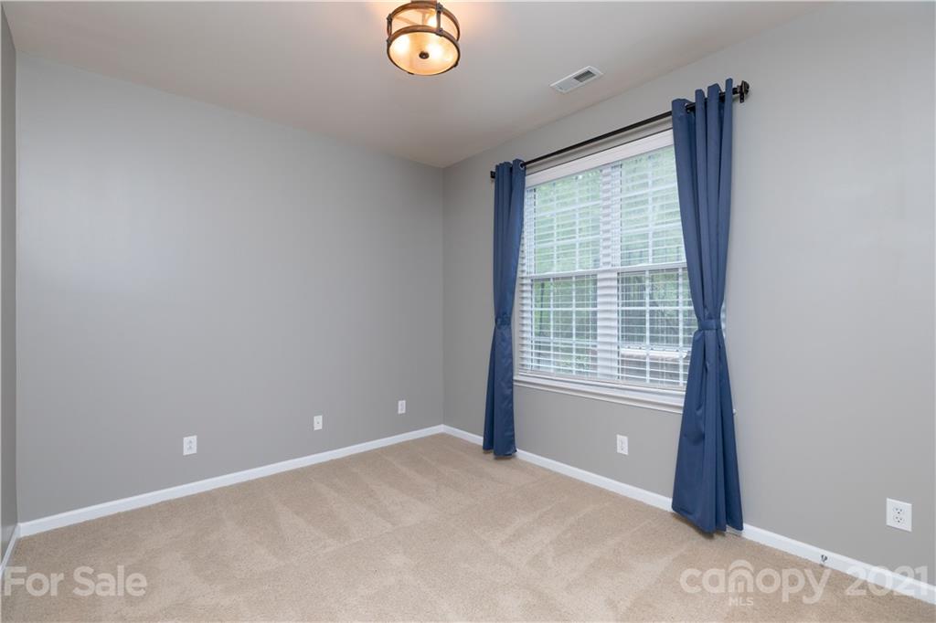 623 6th Baxter Crossing Fort Mill, SC 29708 - Photo 21 of 27 a view of an empty room with a window