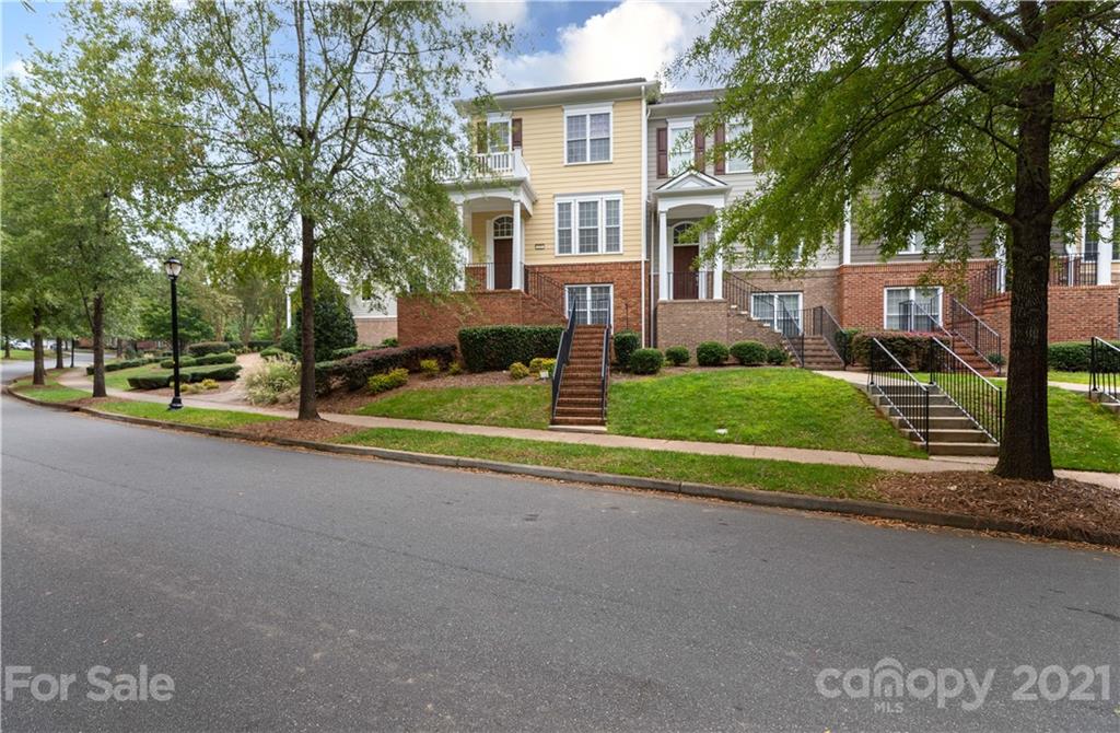 623 6th Baxter Crossing Fort Mill, SC 29708 - Photo 24 of 27 a view of a house with a big yard and large trees