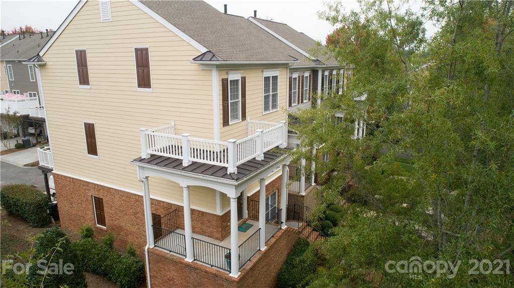 623 6th Baxter Crossing Fort Mill, SC 29708 - Photo 26 of 27 a view of a white building among the top of house