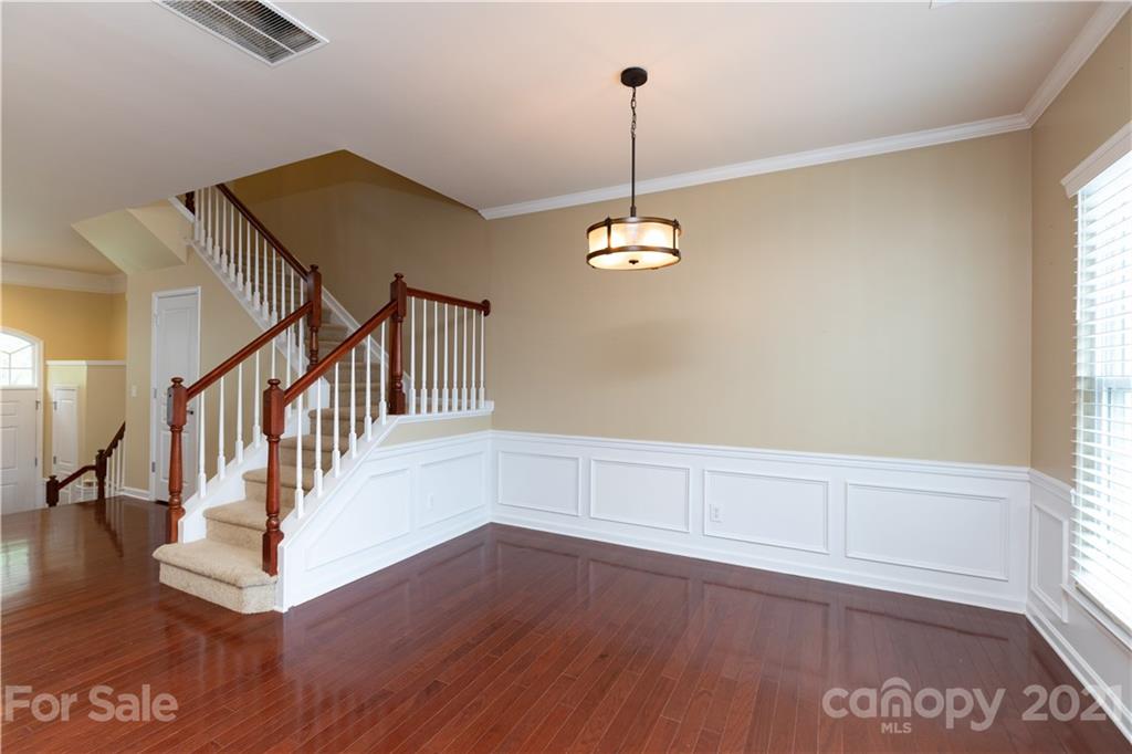 623 6th Baxter Crossing Fort Mill, SC 29708 - Photo 6 of 27 a view of an entryway with wooden floor