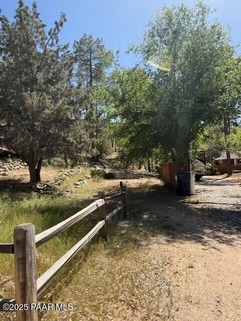 1845 Idylwild Hill Road Prescott, AZ 86305 - Photo 15 of 17 a view of a yard with wooden fence