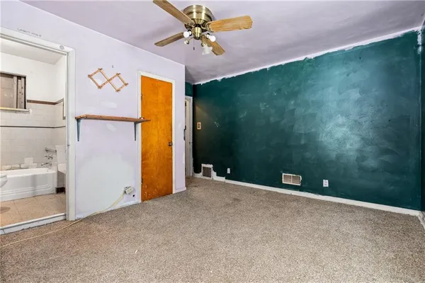 a view of a hallway with a yellow space