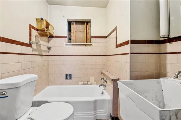 a bathroom with a sink and bathtub
