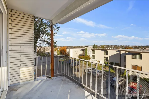a view of a balcony with city view