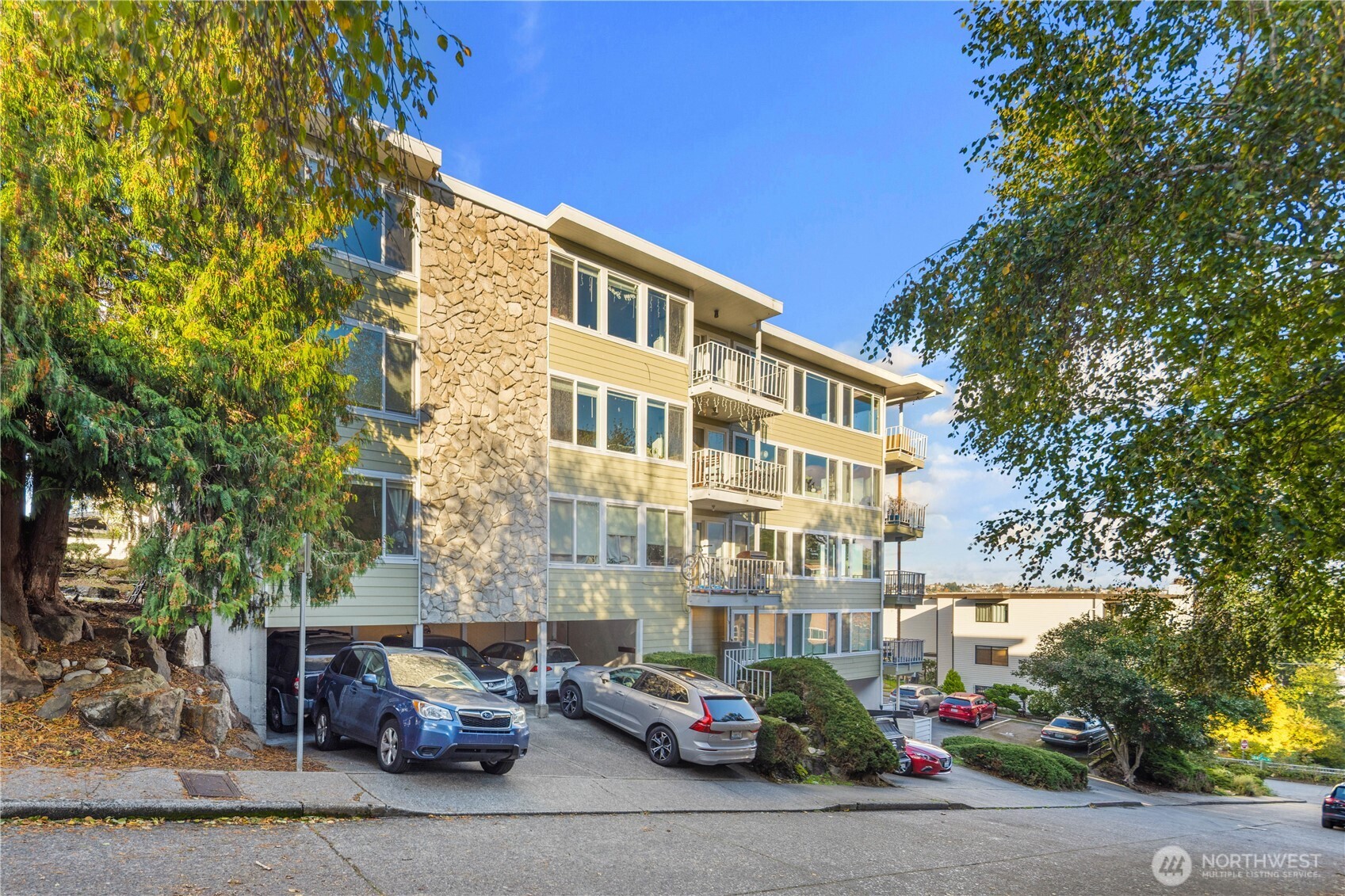 3600 25th Avenue West Seattle, WA 98199 - Photo 28 of 30 a car parked in front of a building