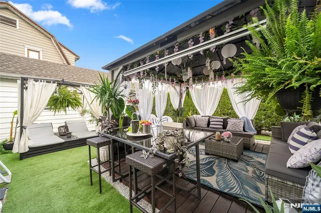 a view of yard with patio