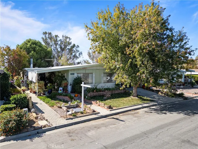 front view of a house with a patio