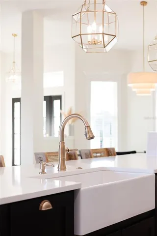 a bedroom with double bed and a large window