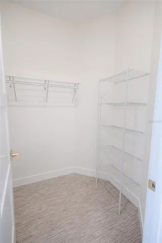 a white bath tub sitting next to a white sink