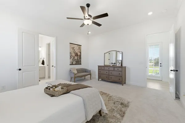 a bedroom with furniture and window