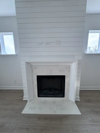 a living room with a fireplace