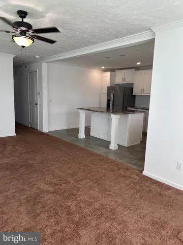a view of kitchen and living room