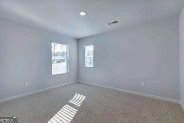 a view of hallway with stairs