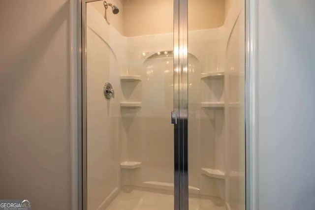 a bathroom with a sink a mirror and a toilet