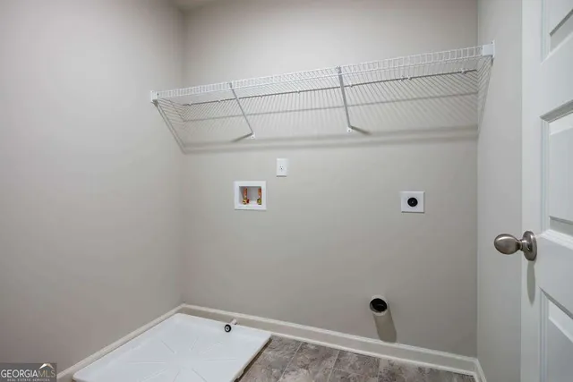 a view of a room with racks on the wall