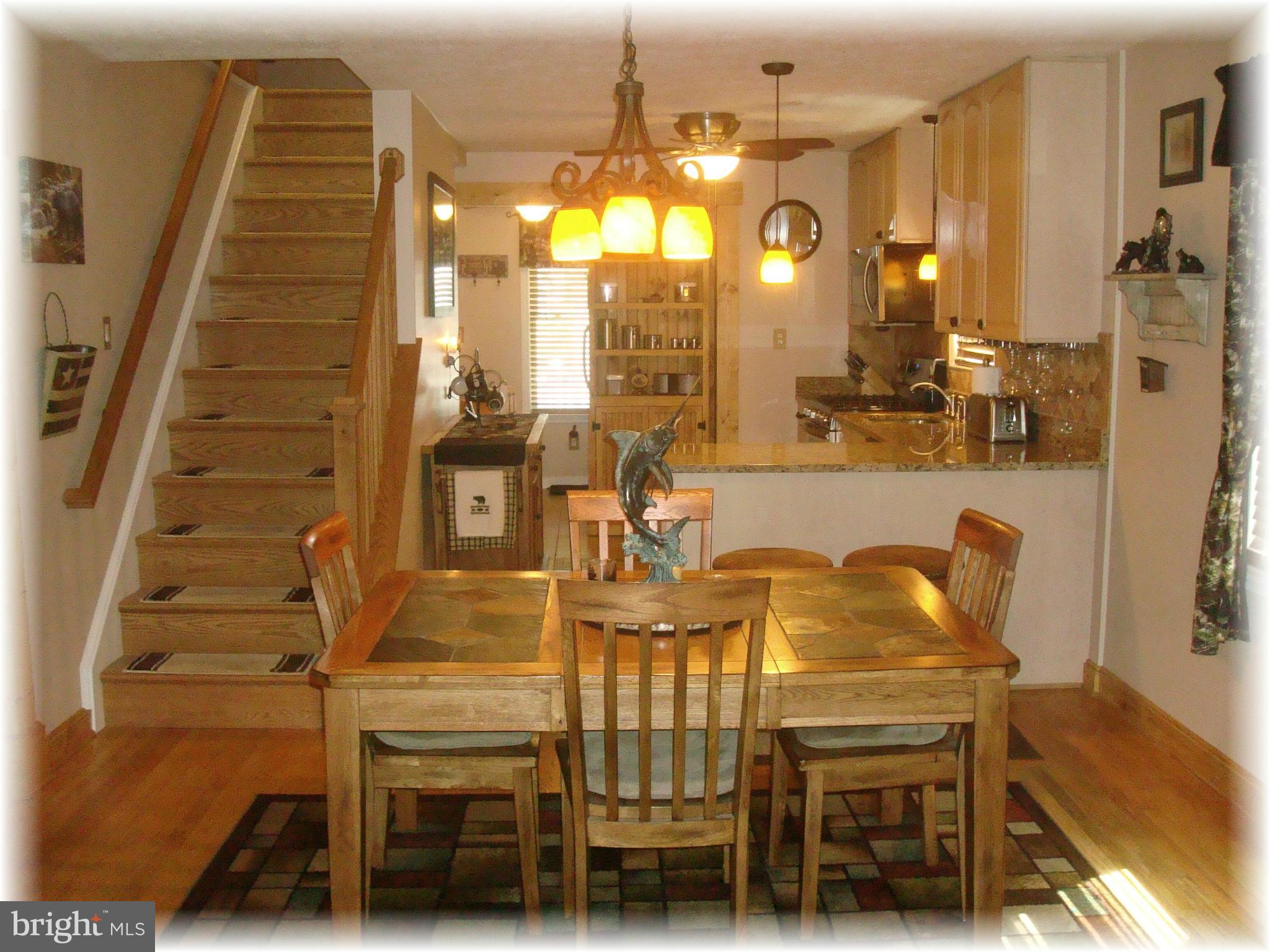 3306 Willoughby Road Baltimore, MD 21234 - Photo 11 of 30 Dining Room w/wood flooring opens to the kitchen