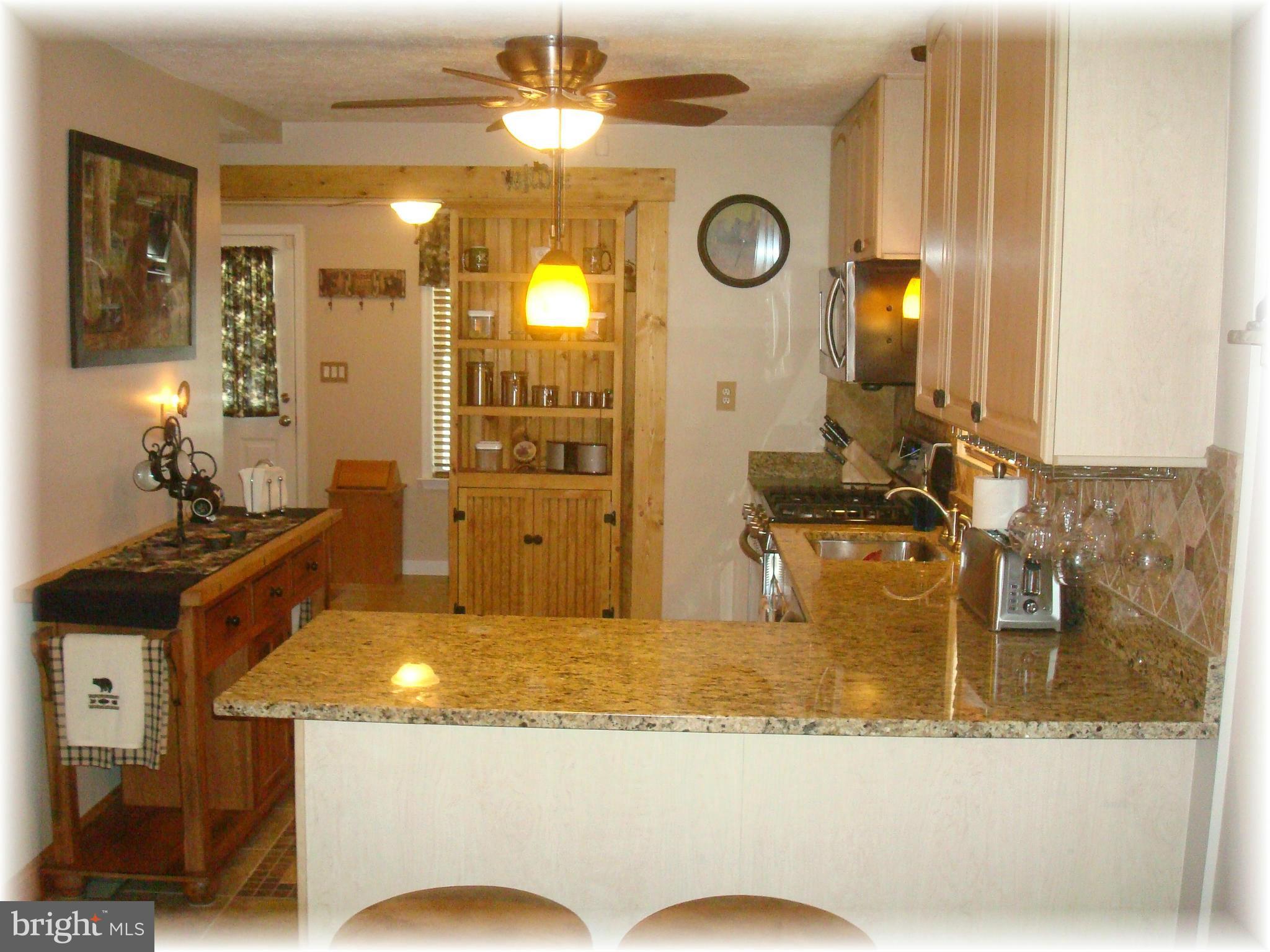 3306 Willoughby Road Baltimore, MD 21234 - Photo 13 of 30 Granite tops, maple cabinets & s/s appliances.