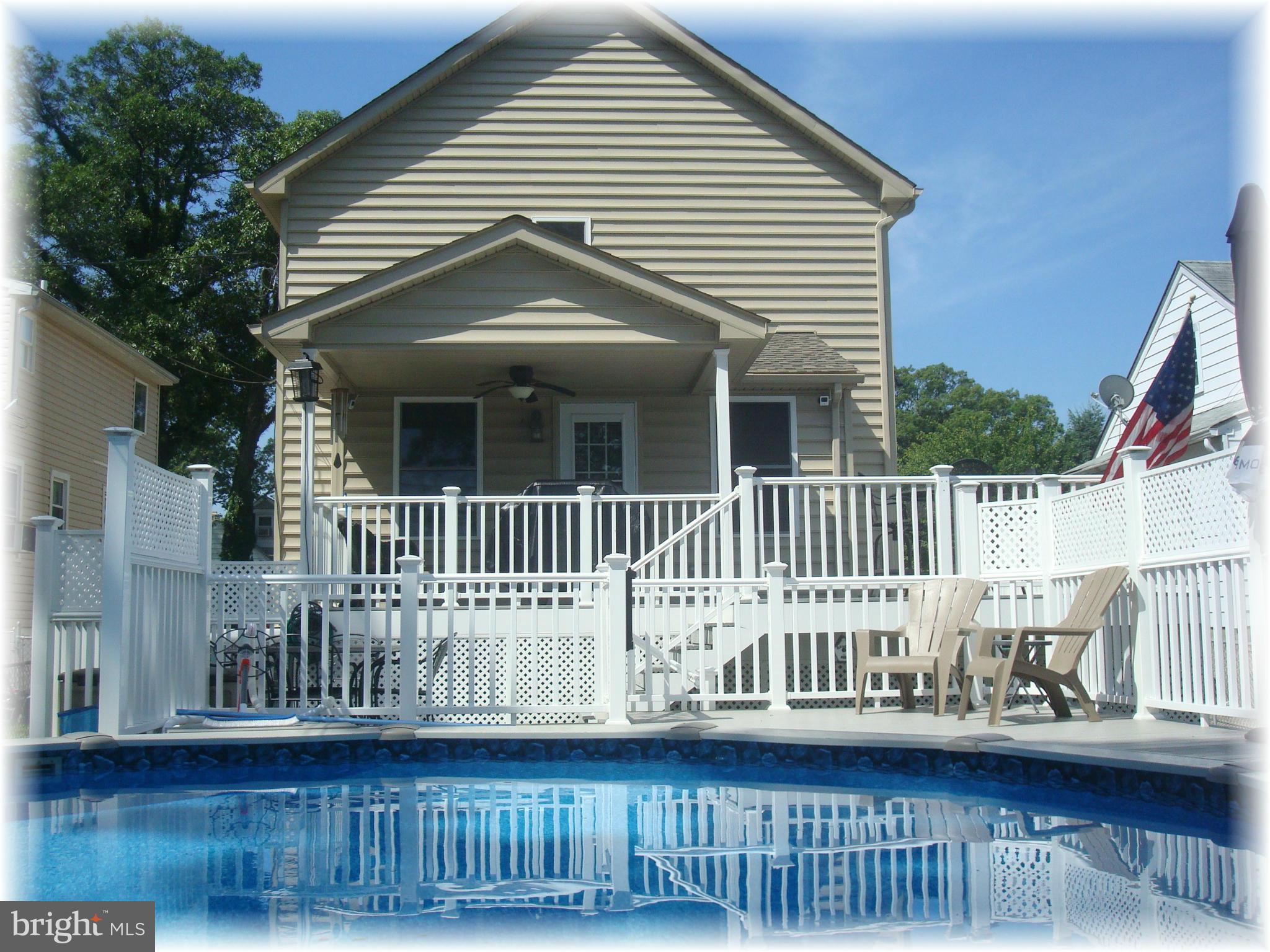 3306 Willoughby Road Baltimore, MD 21234 - Photo 6 of 30 Maintenance-free 3-tier decking leads to your pool