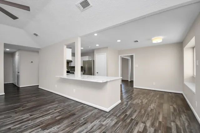 a view of a backyard with plants