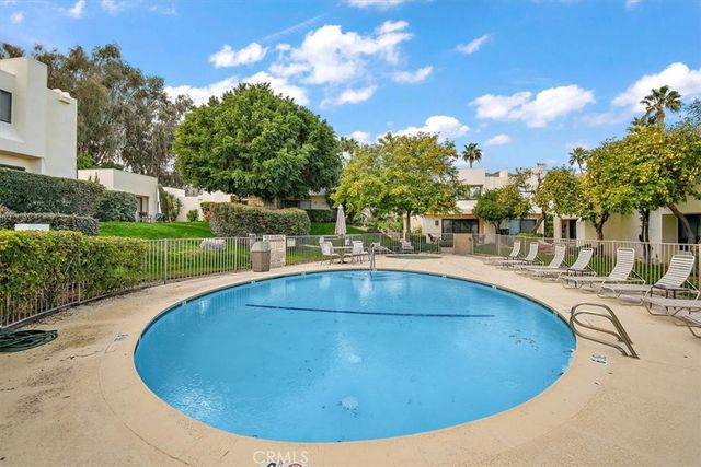 a view of outdoor space and swimming pool