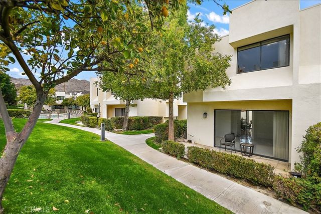 a view of a back yard of the house