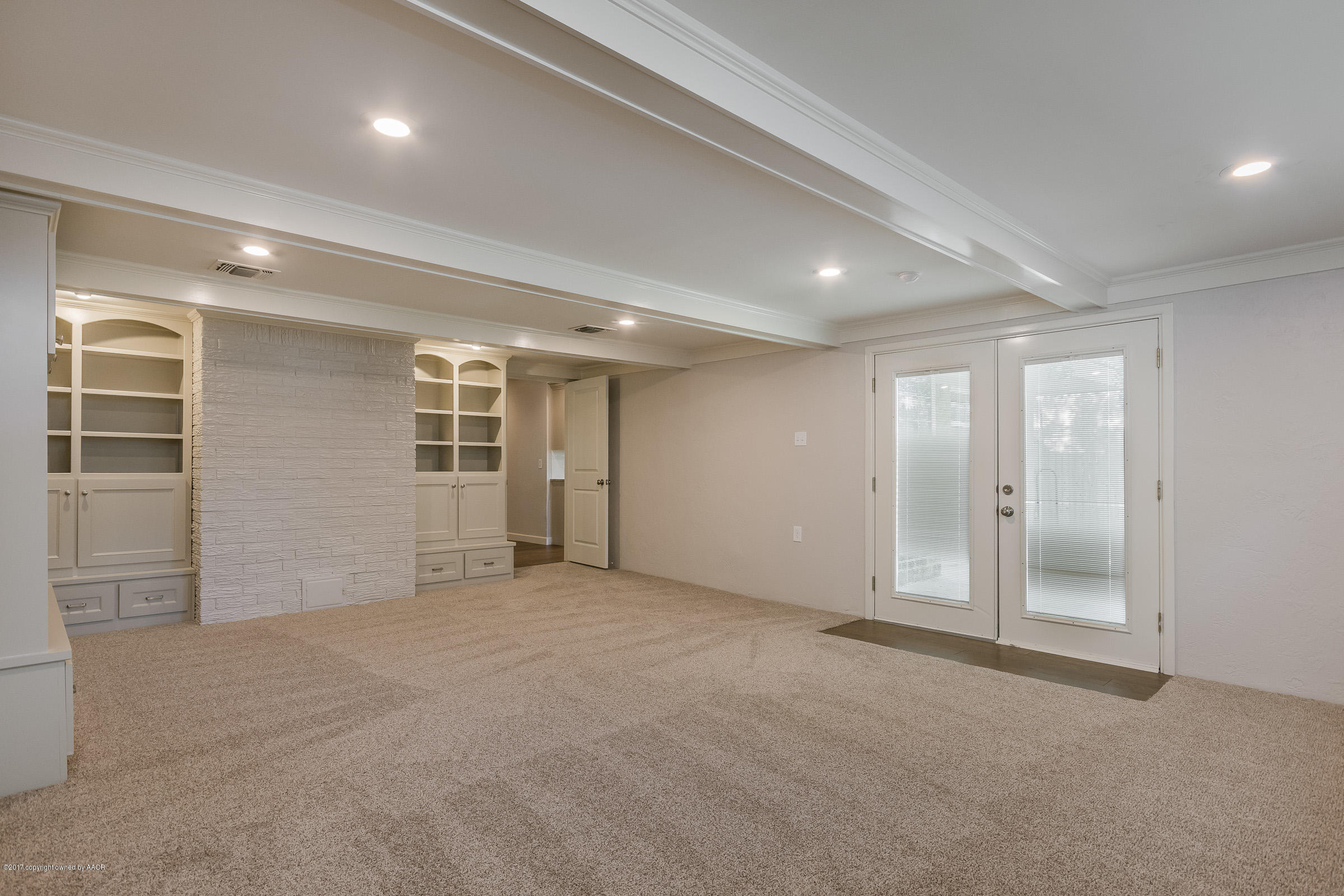 7208 Calumet Road Amarillo, TX 79106 - Photo 13 of 22 an empty room with windows