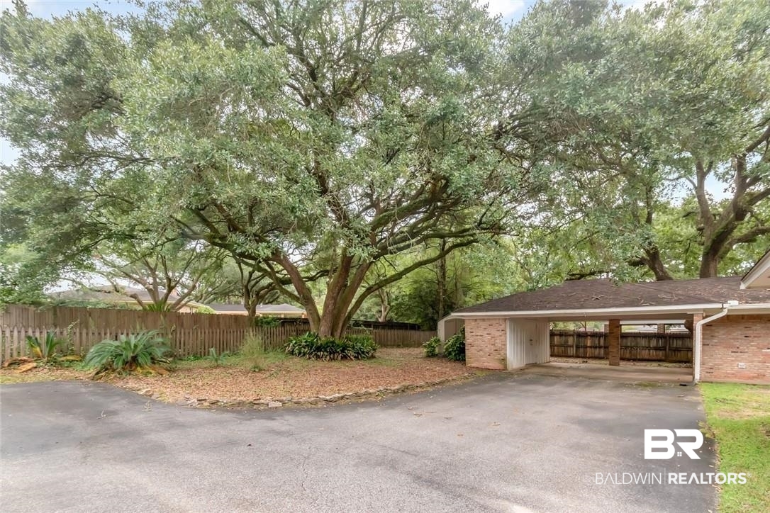6109 Timberly Road North Mobile, AL 36609 - Photo 25 of 26 View of front facade featuring a carport