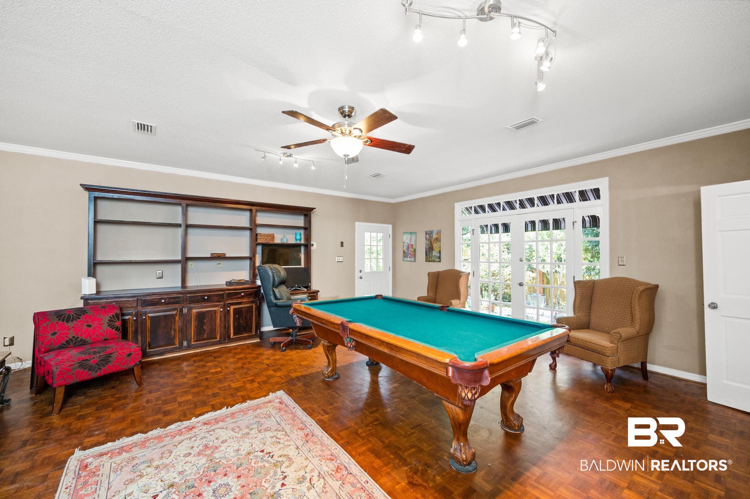 6705 Ridgeland Road South Mobile, AL 36695 - Photo 16 of 44 Playroom with french doors, pool table, ornamental molding, a textured ceiling, and ceiling fan