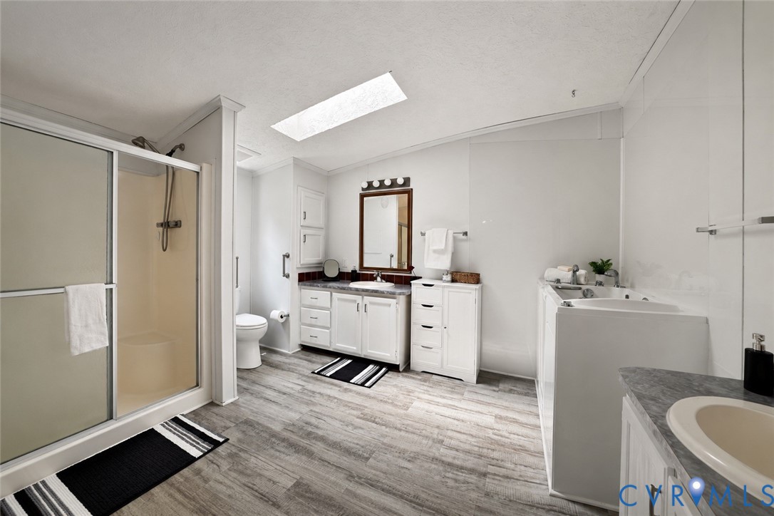 2229 Texas School Road Wingina, VA 24599 - Photo 14 of 22 Spacious primary bathroom with walk-in shower, wal