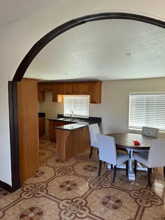 a workspace with furniture and window