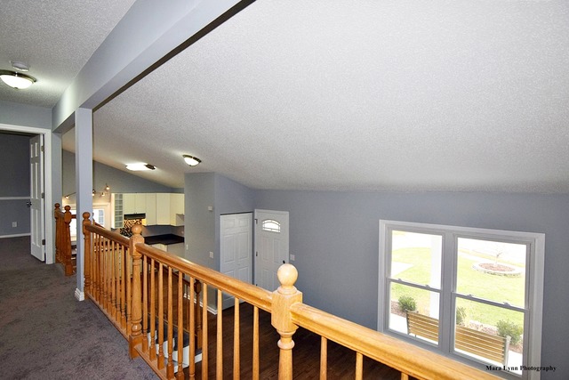 309 Hopi Court Carol Stream, IL 60188 - Photo 18 of 25 a view of hallway with stairs