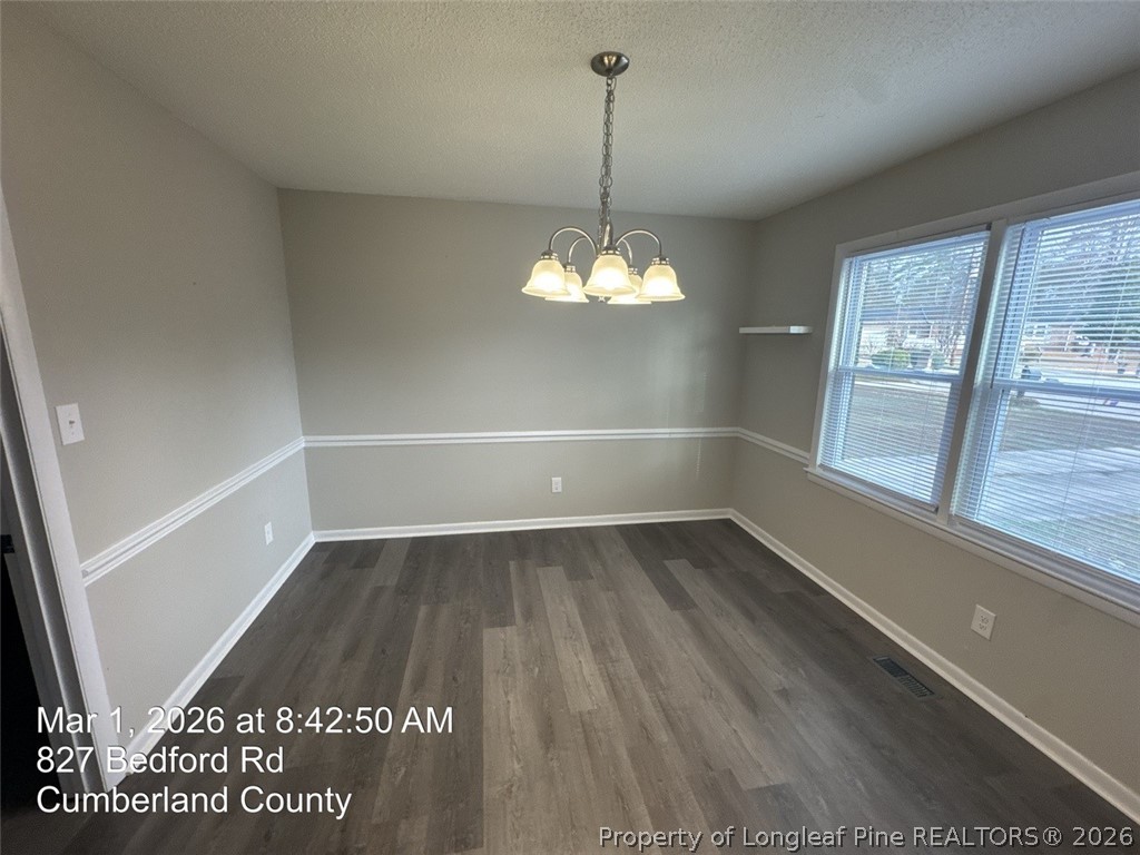 825 Bedford Road Fayetteville, NC 28303 - Photo 6 of 26 a view of an empty room with a window
