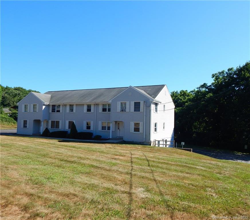 1469 Boston Post Road, Unit 11 Westbrook, CT 06498 - Photo 1 of 1 a house view with a outdoor space