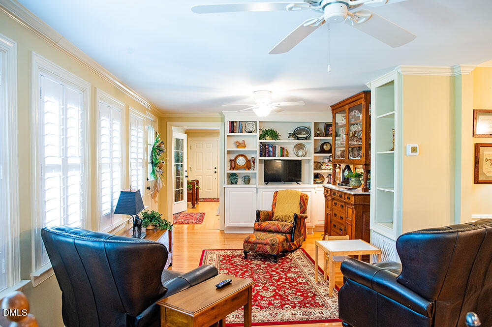75 Frank Timberlake Road Timberlake, NC 27583 - Photo 23 of 93 a living room with furniture and a large window