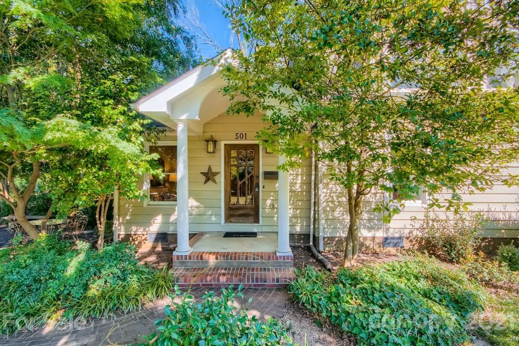 501 Marsh Road Charlotte, NC 28209 - Photo 1 of 27 a front view of a house with garden